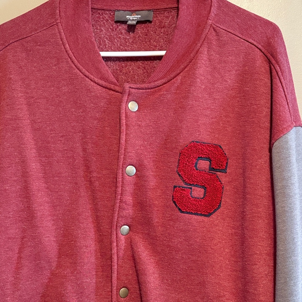 Varsity style sweater size XL with S
